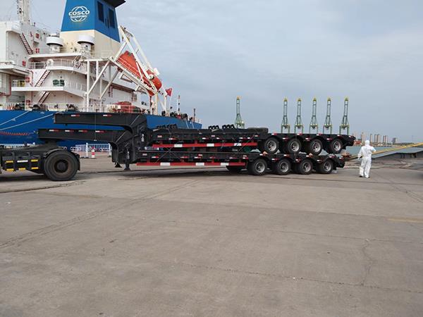 By roro ship- Lowbed trailer